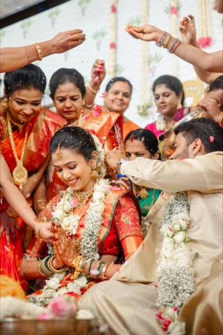 Bride surrounded by guests during a wedding ceremony