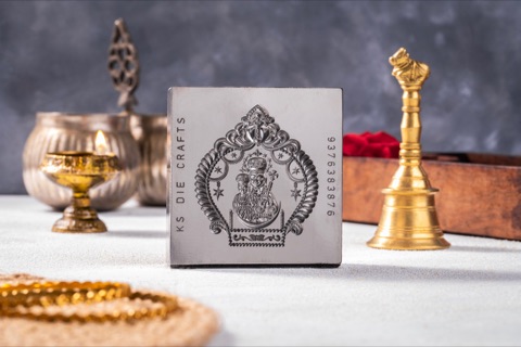 Decorative craft packaging beside brass lamps and ceremonial objects