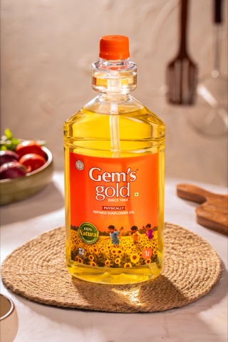 Bottle of cooking oil on a woven mat in a kitchen setting