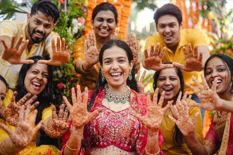 Bride and friends displaying their decorated hands
